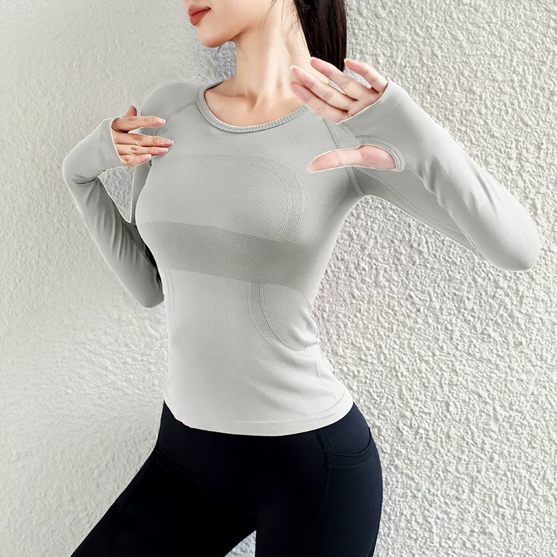 Quần áo tập yoga cho nữ, áo thể thao dài tay, liền thân, không đường may, ôm sát, giúp thon gọn, chạy bộ, co giãn cao, nhanh khô.