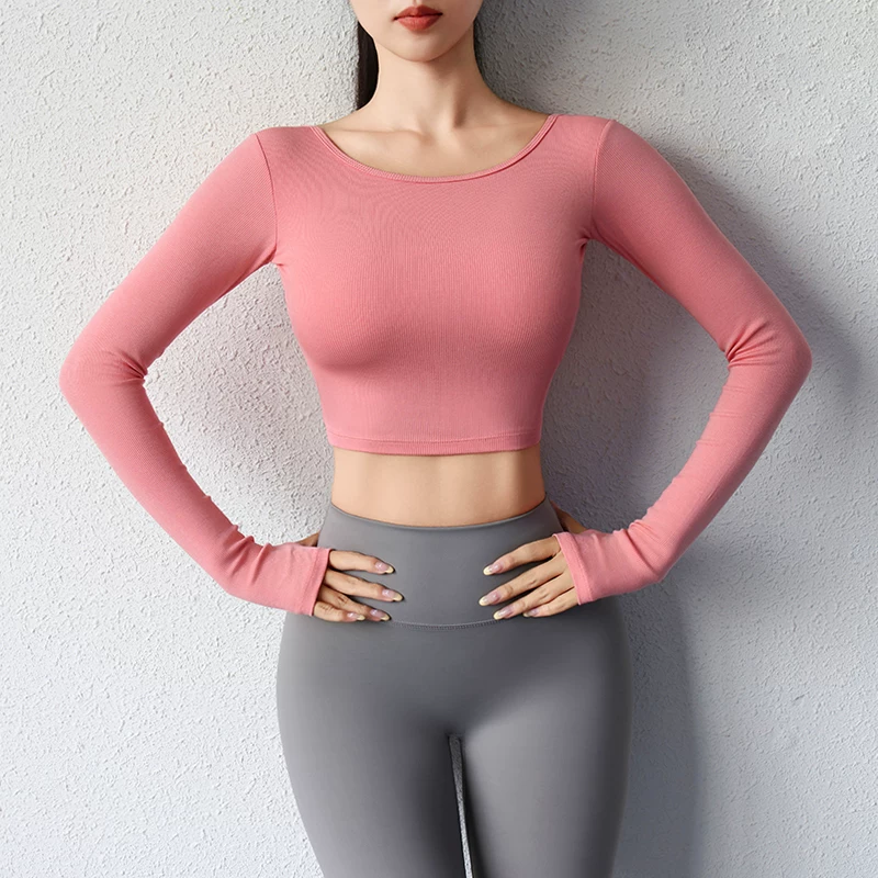 Quần áo tập thể dục chống sốc có đệm ngực dành cho nữ, áo thể thao mùa thu mới, lưng khoét gợi cảm, tay áo dài tập luyện bó sát.