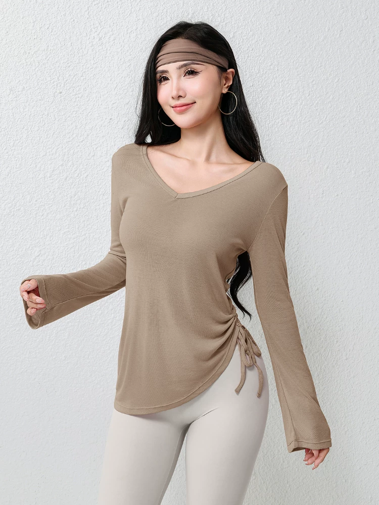 Trang phục tập yoga thông thường, áo khoác thể thao yoga, áo thun nữ dài tay che hông có dây rút xếp ly, áo rộng rãi cho mùa thu đông.