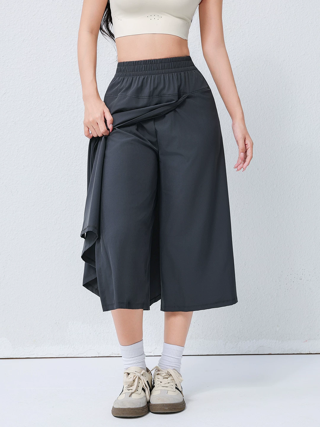 Quần váy nữ phong cách núi rừng, mẫu mới xuân 2026, cạp cao, tôn dáng, mát mẻ, có độ rủ và cảm giác thân thiện với da, quần váy dài 8 phần.