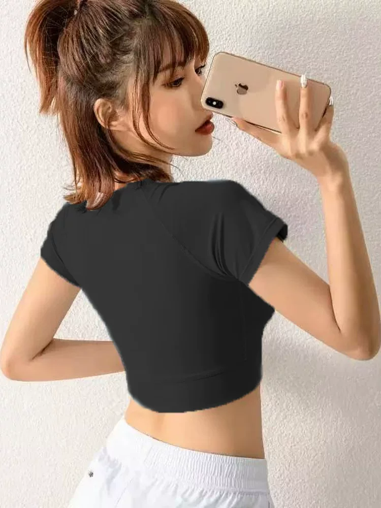 Áo thun thể thao ngắn tay co giãn bó sát dành cho nữ, kiểu dáng ngắn gợi cảm, tôn dáng, hở rốn, trang phục tập thể dục, áo tập yoga