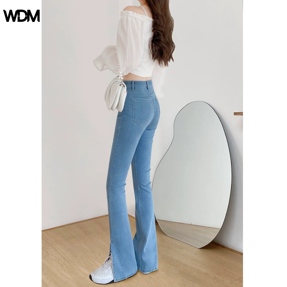 Quần jeans xẻ tà nữ, ôm dáng, cạp cao, tôn dáng, kiểu mới xuân thu 2025, màu sáng, dài chạm sàn, chất liệu co giãn.