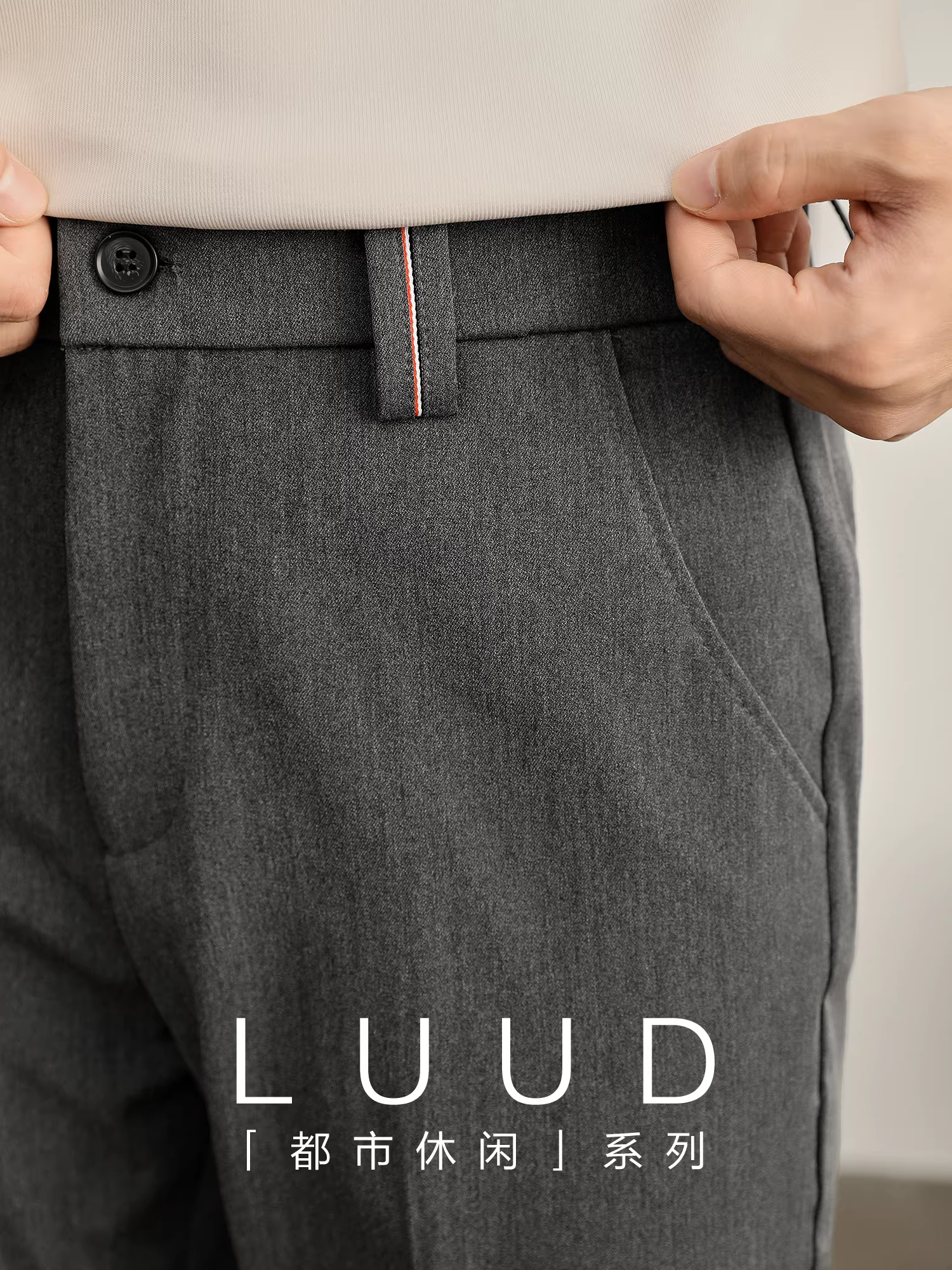 Quần tây nam LUUD thời trang tối giản, chất liệu vải tuýt cao cấp, thiết kế đường kẻ ba màu ở eo, không nhăn và không cần là ủi.