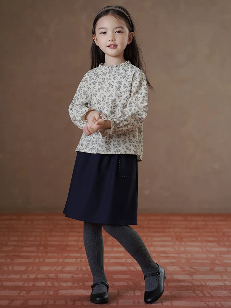 Quần áo trẻ em mùa thu phong cách mới đơn giản dáng rộng váy dài vừa phải cho bé gái váy nửa váy phong cách học sinh cho trẻ lớn mùa xuân và mùa thu