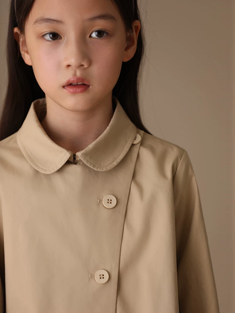 Quần áo trẻ em mùa xuân thu áo khoác trẻ em thiết kế đơn giản cổ búp bê áo cho trẻ lớn hơn áo khoác cho bé gái