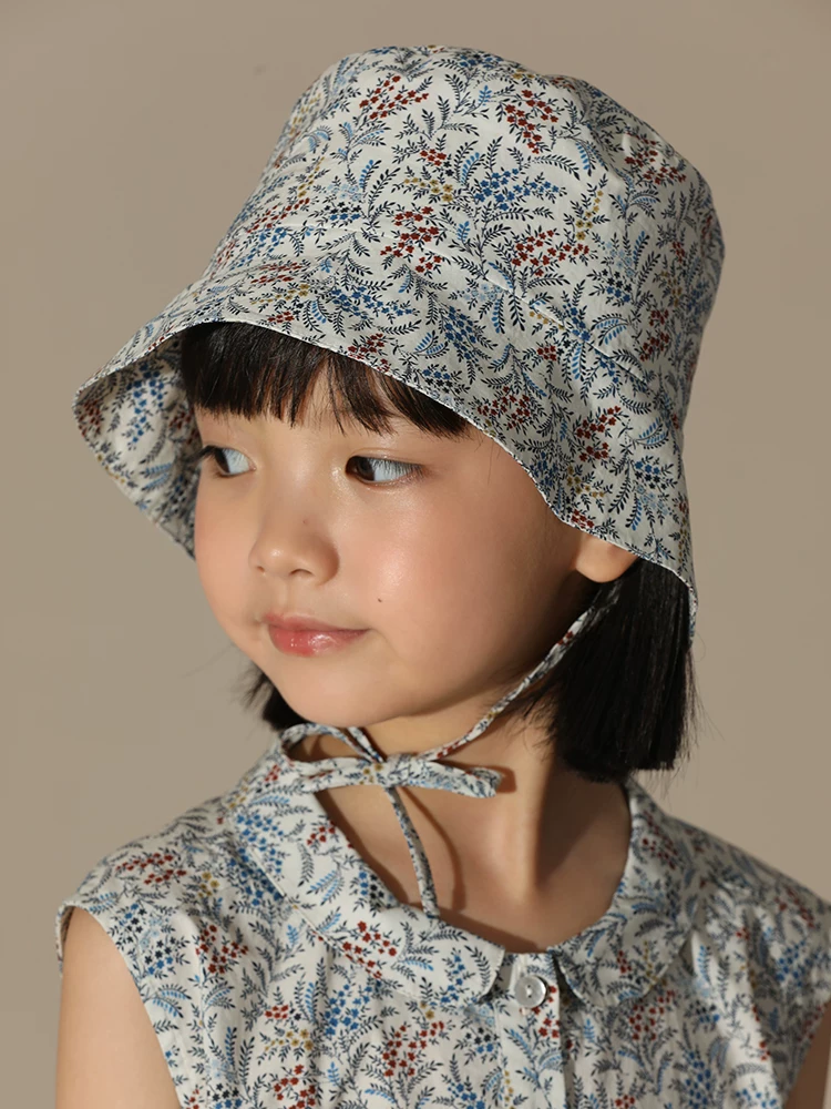 Quần áo trẻ em Hazi Đầu thu Sản phẩm mới Cotton nguyên chất Phong cách đồng quê Pháp Mũ ngư dân làm thon gọn khuôn mặt Phong cách cha mẹ và con cái Mũ hoa cho bé gái