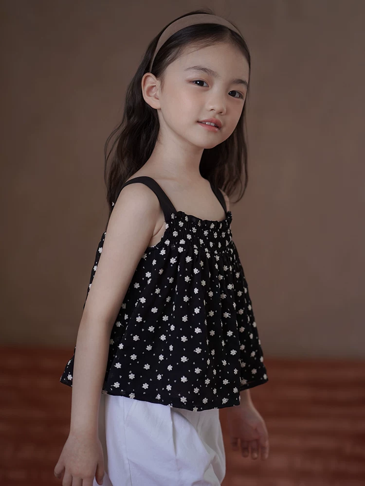 Quần áo trẻ em áo vest màu đen họa tiết hoa kỳ nghỉ áo ba lỗ cho bé gái áo lót thường ngày mát mẻ cho bé gái mùa hè