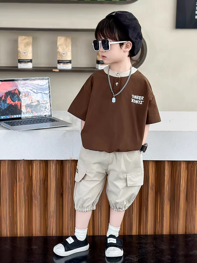 Bộ đồ bé trai ngắn tay hè 2025 kiểu mới thời trang quần áo trẻ em bé trai đẹp trai bộ thể thao hai mảnh mùa hè
