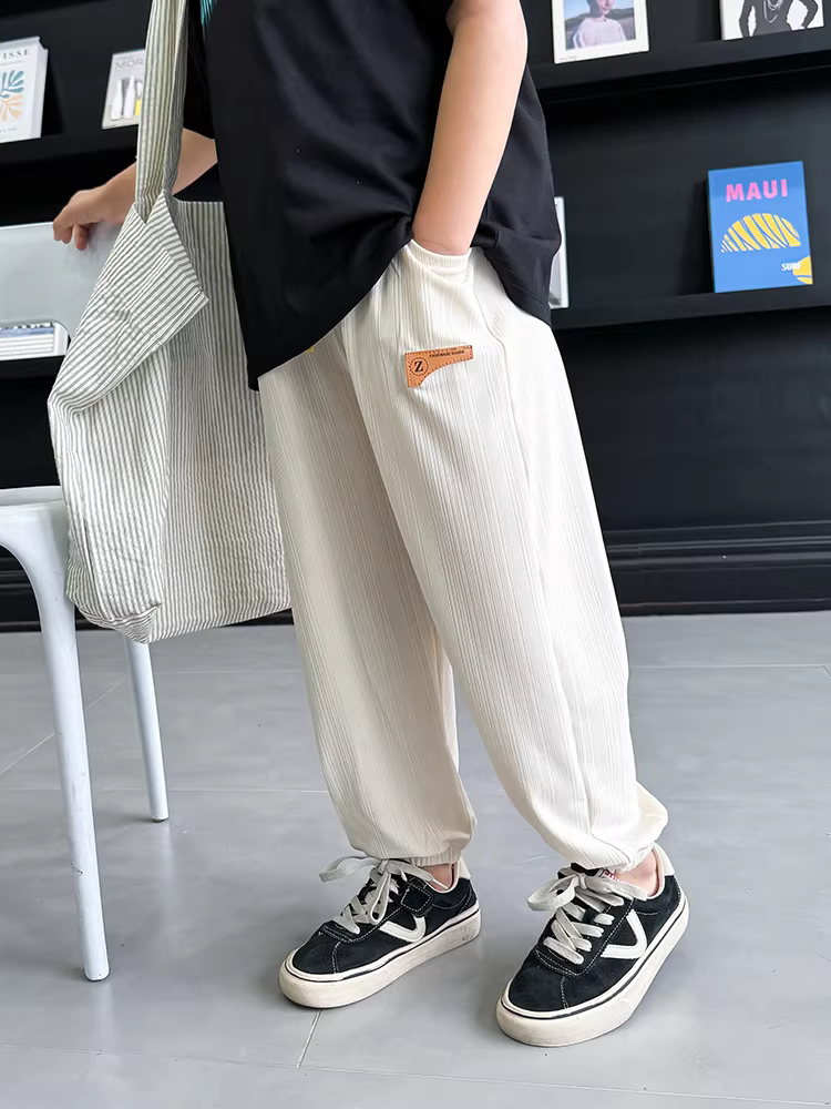 Quần trẻ em bé trai chống muỗi mùa hè 2025 kiểu mới mỏng nhẹ quần dài trẻ em thời trang cá tính trẻ trung