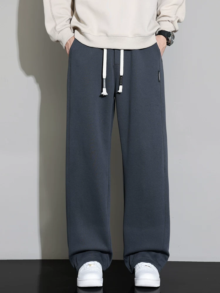 Quần âu nam Jeanswest 2026 màu xám mới, dáng thẳng, chất liệu mềm mại, ống rộng, dài, thích hợp cho mùa xuân và mùa thu.