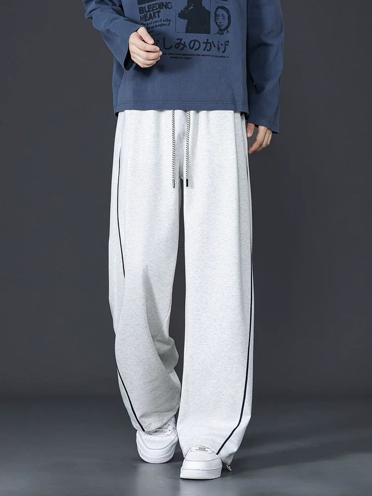 Quần dài nam Jeanswest dáng suông, phối màu, chất liệu dày dặn, phong cách casual, hợp thời trang xuân thu, đa năng.