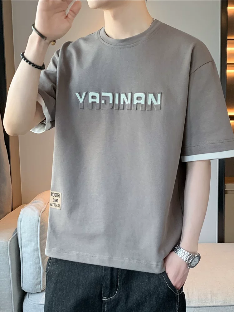 Áo thun ngắn tay in chữ thương hiệu thời trang phong cách Mỹ của Jeanswest dành cho nam, mùa xuân hè, áo màu đen rộng rãi, thoáng khí, phong cách giản dị.