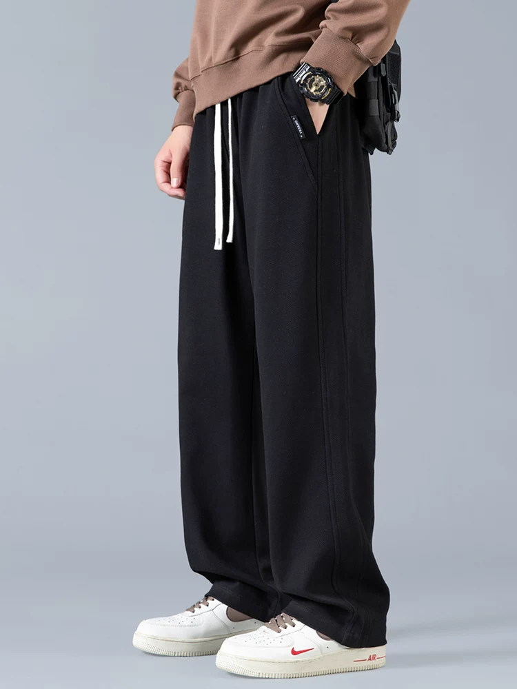 Quần dài ống rộng dáng thẳng Jeanswest 2026 mới dành cho nam, mùa xuân thu, quần thể thao cao cấp, dáng rộng.