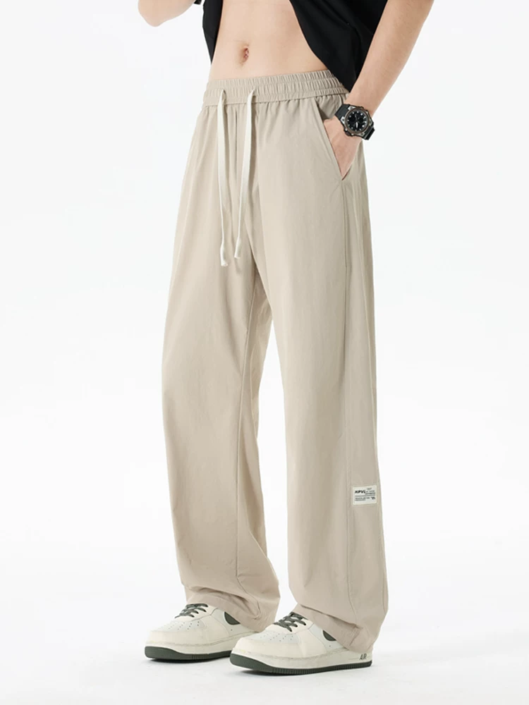 Quần Jeanswest nam ống thẳng Quần dài dáng rộng hợp thời trang mùa xuân Thương hiệu thời trang cao cấp Quần dài ống rộng rộng rãi