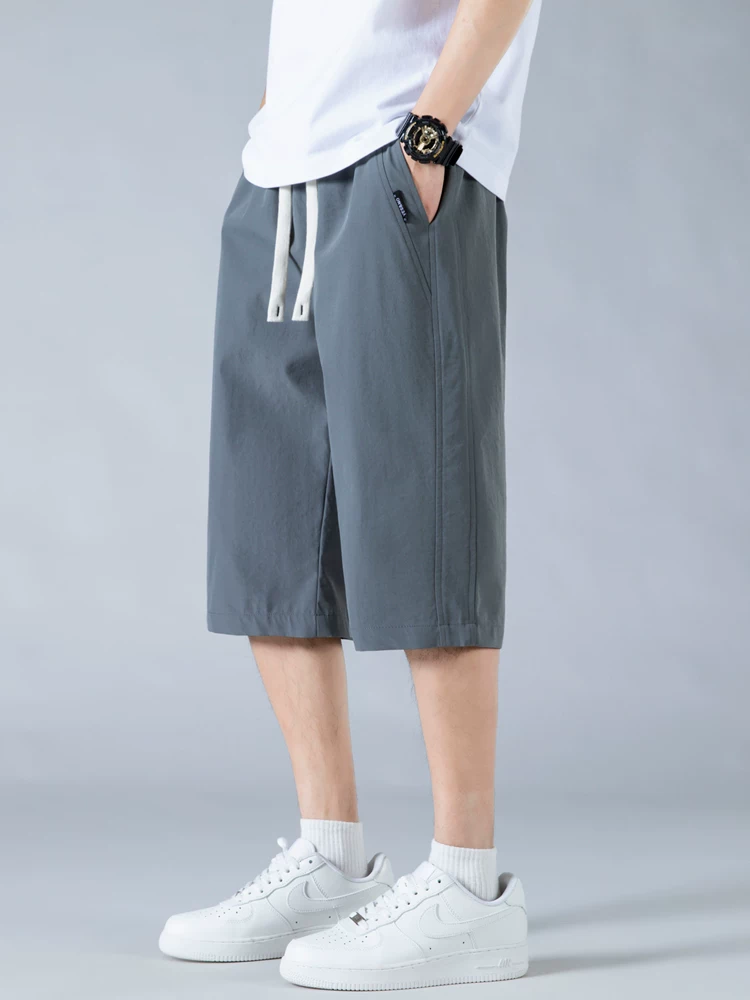 Quần short đa năng hợp thời trang Jeanswest Ice Silk Thin dành cho nam, quần dài bảy phần tư rộng rãi, thoáng khí, nhanh khô, phong cách thường ngày mùa hè.