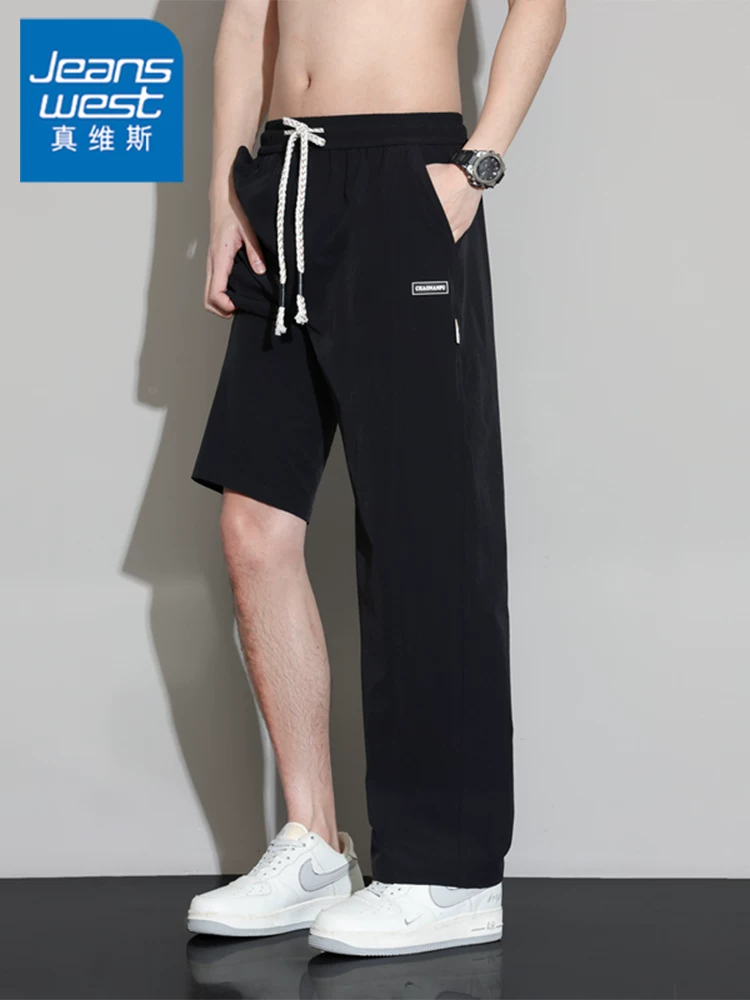 Quần dài thể thao ống đứng phong cách Mỹ thời thượng của Jeanswest dành cho nam, mùa xuân hè, cảm giác cao cấp, dáng rộng, đa năng, thoáng khí.