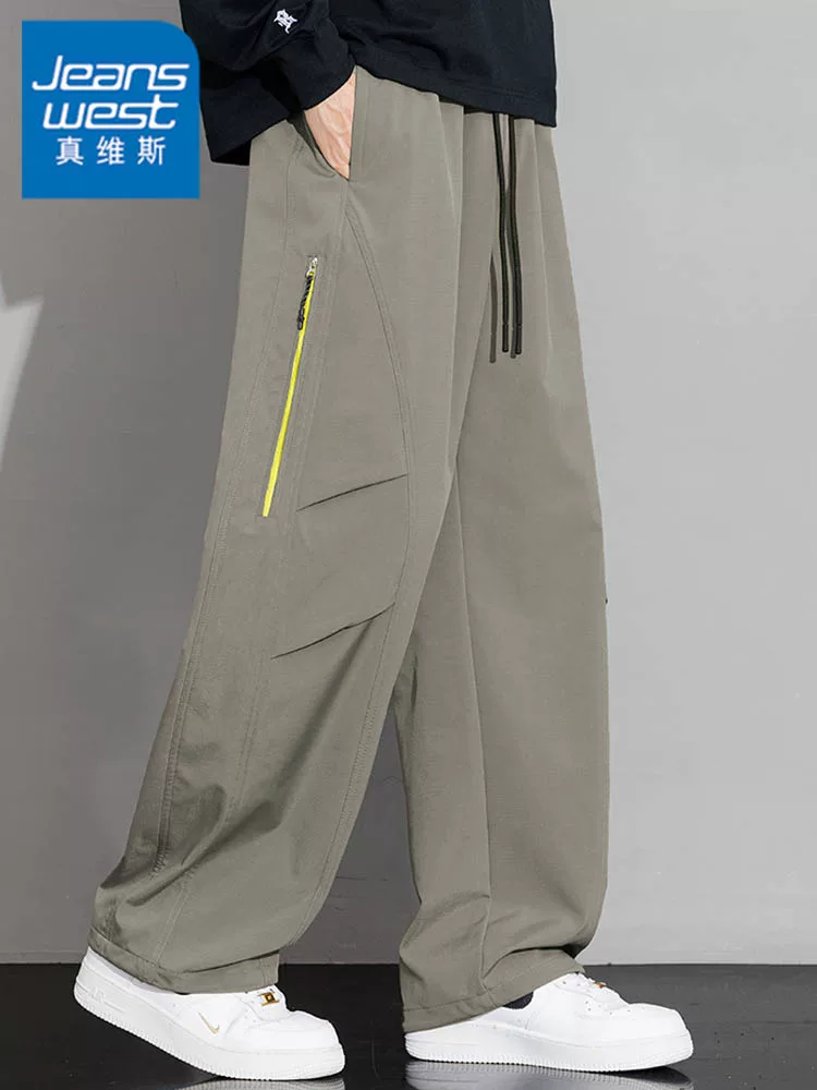 Quần dài thể thao đa năng, dáng rộng, thời trang, chất liệu kaki, dành cho nam giới của thương hiệu Jeanswest, thích hợp cho mùa xuân và mùa thu.