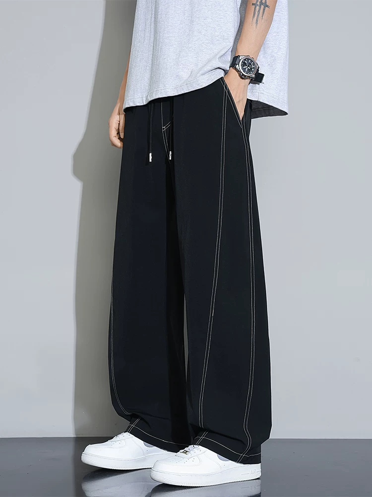 Quần dài nam chất liệu lụa băng kiểu Mỹ của Jeanswest, quần dài dáng rộng thời trang cao cấp mùa hè, có dây rút mỏng.