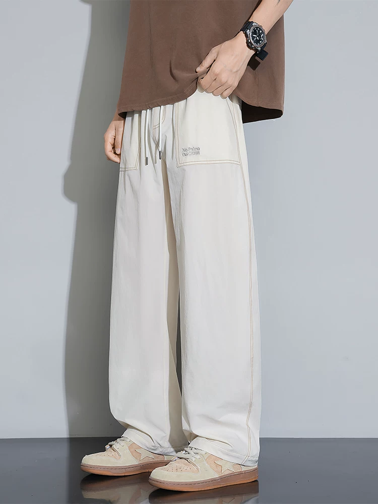 Quần âu nam Jeanswest 2025 kiểu mới cao cấp, chất liệu lụa đá mỏng thoáng khí, dáng thẳng, đa năng, thoải mái, thích hợp cho mùa hè.