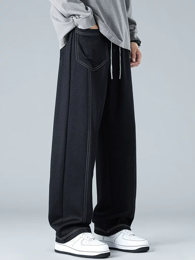 Quần thể thao dệt kim kiểu Mỹ của Jeanswest dành cho nam, thương hiệu thời thượng mùa xuân hè, quần dài dáng rộng cao cấp, cá tính và sành điệu.
