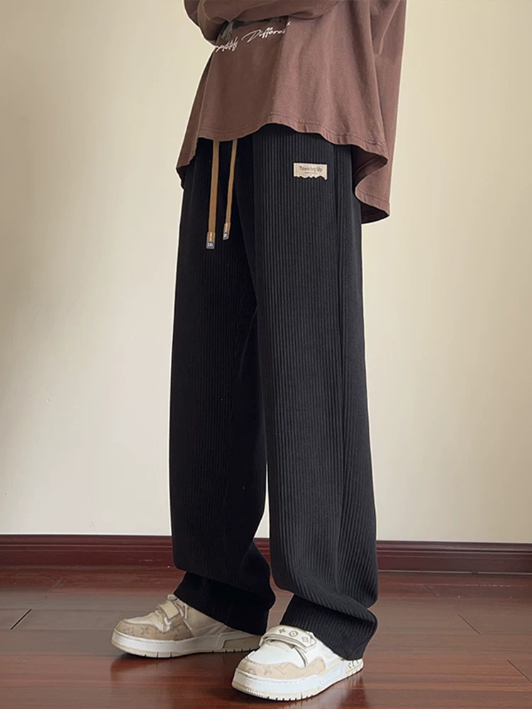Quần jeanswest đơn giản màu trơn đa năng dành cho nam giới, quần ống rộng thẳng hợp thời trang mùa xuân mới.