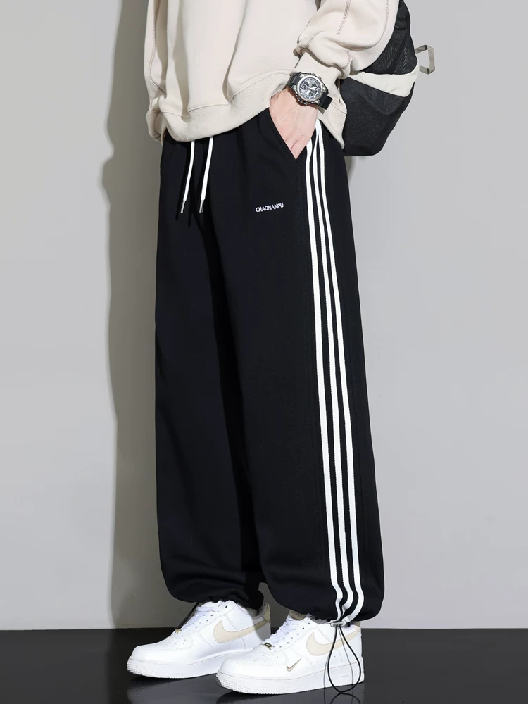 Quần dài ống rộng phong cách Mỹ thời thượng của Jeanswest dành cho nam, mùa xuân thu, cảm giác cao cấp, dáng rộng, đa năng, quần dài có độ rủ.