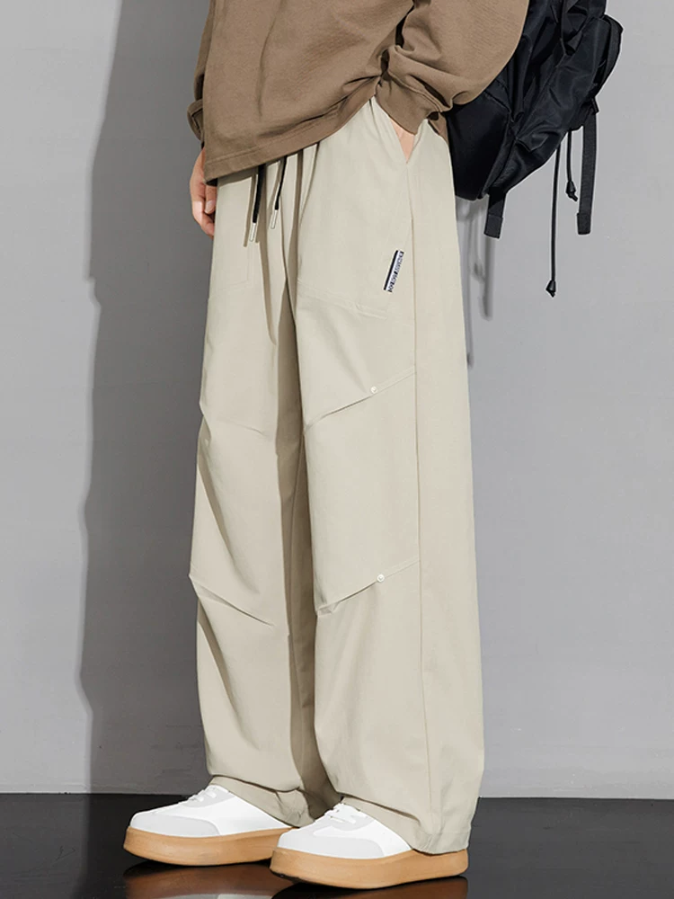 Quần dài ống rộng phong cách Mỹ của Jeanswest dành cho nam, quần dài ống rộng đa năng, thương hiệu thời trang xuân thu cao cấp.