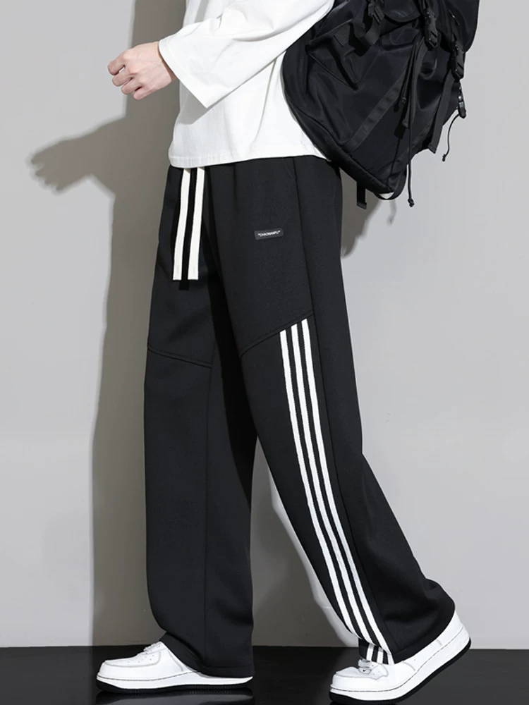 Quần dài nam Jeanswest phối màu ba sọc, dáng suông, phong cách thường ngày, mùa xuân thu, dáng rộng, đa năng, thương hiệu thời thượng, cảm giác cao cấp, quần dài.