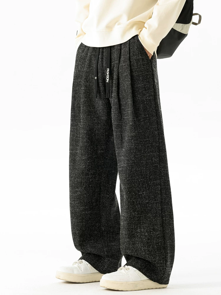 Quần dài ống rộng kiểu Mỹ cao cấp của Jeanswest dành cho nam, quần dài rộng rãi hợp thời trang đa năng dành cho mùa xuân và mùa thu.