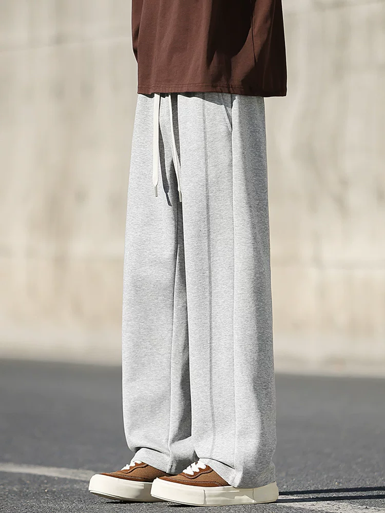 Quần jogger nam Jeanswest 2026 mới, cạp chun, ống thẳng, chất liệu thun, mặc xuân thu, dáng rộng, thương hiệu thời trang cao cấp.
