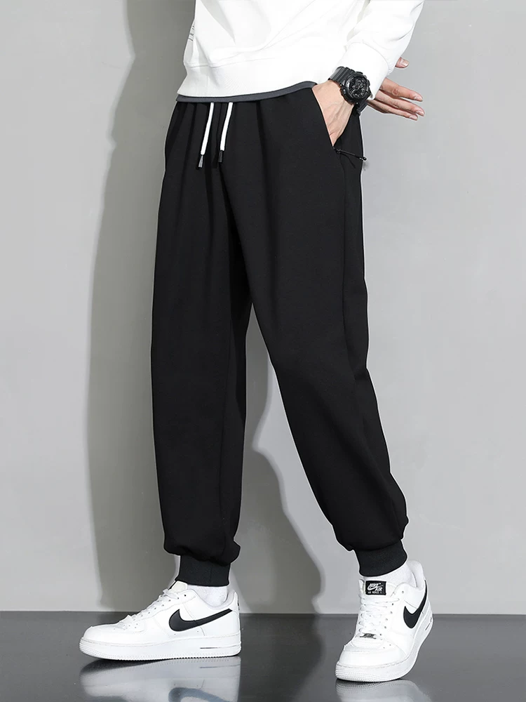 Quần cotton nguyên chất Jeanswest dành cho nam, quần thể thao dáng rộng, quần jogger nam xuân thu, quần dài đa năng cao cấp.