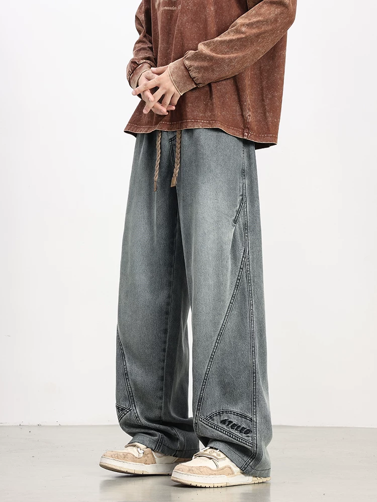 Quần jean thêu viền cong thông thường của Jeanswest dành cho nam, mùa xuân và mùa thu, cỡ lớn, quần ống rộng màu đen dáng rộng.