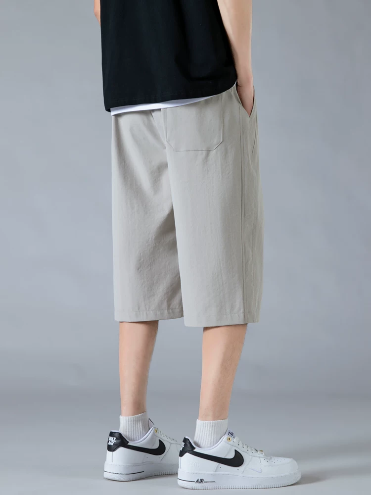 Quần short đa năng hợp thời trang Jeanswest Ice Silk Thin dành cho nam, quần dài bảy phần tư rộng rãi, thoáng khí, nhanh khô, phong cách thường ngày mùa hè.