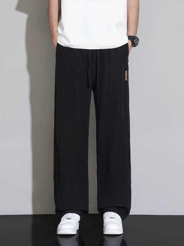 Quần dài ống đứng Lyocell cao cấp của Jeanswest dành cho nam, quần dài dáng rộng đa năng phong cách Mỹ mùa xuân thu.