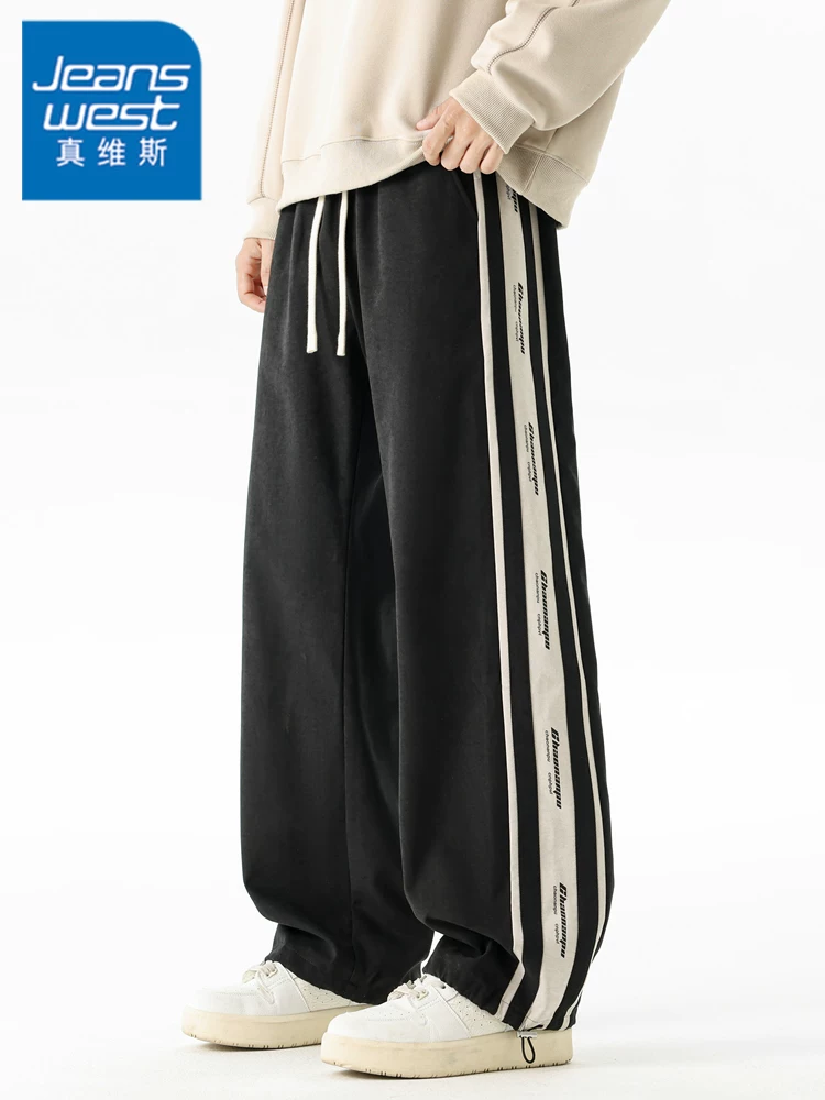Quần dài thể thao sọc chắp vá phong cách Mỹ của Jeanswest dành cho nam, mùa xuân thu, cảm giác cao cấp, dáng rộng, quần dài thể thao đa năng.