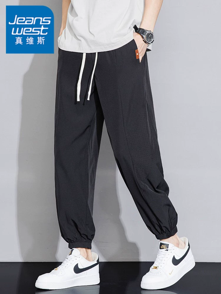 Quần jogger nam Jeanswest 2025 chất liệu lụa đá mỏng, mùa hè, màu trơn, đa năng, dáng rộng, suông, thể thao.