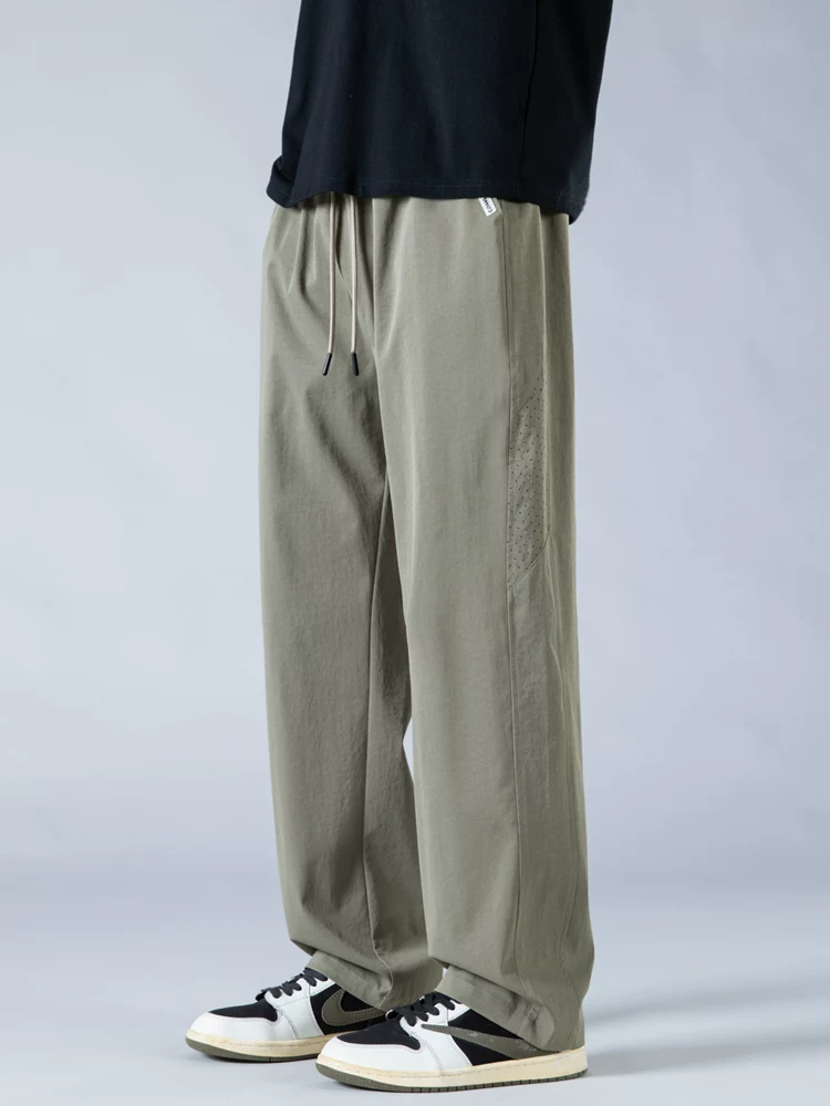 Quần dài nam Jeanswest chất liệu vải lưới tơ đá, nhanh khô, dáng thẳng, rộng rãi, phong cách Mỹ, thời trang, đa năng, ống rộng, thích hợp cho mùa hè.