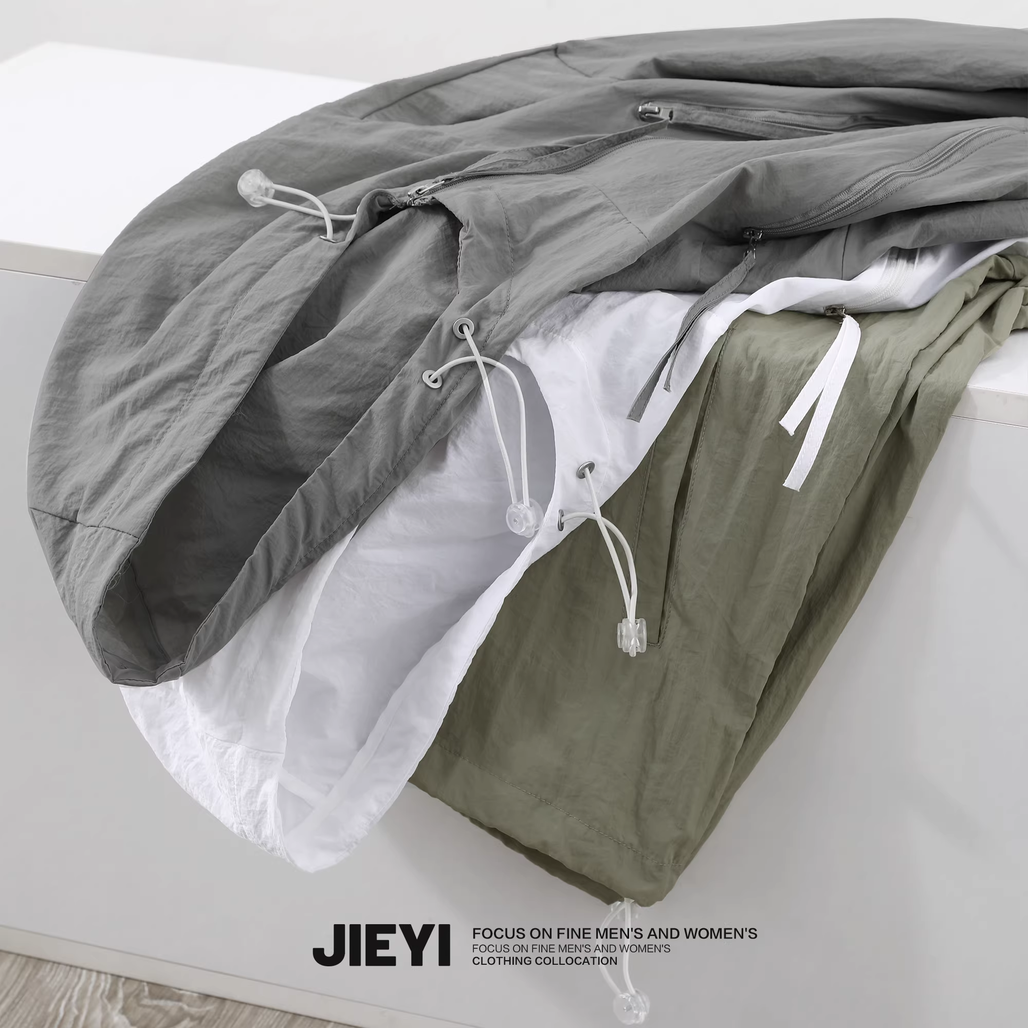 Áo khoác ngoài đi làm thường ngày màu trơn, chống nắng khi câu cá, có mũ trùm đầu, áo khoác mỏng nhiều túi, kiểu dáng sang trọng nhẹ nhàng.