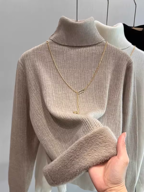 Áo len nữ xuất khẩu Thâm Quyến, chất liệu lông cừu dày dặn, cổ cao, lớp lót bên trong dày dặn, kiểu dáng liền thân, thích hợp cho mùa thu đông.