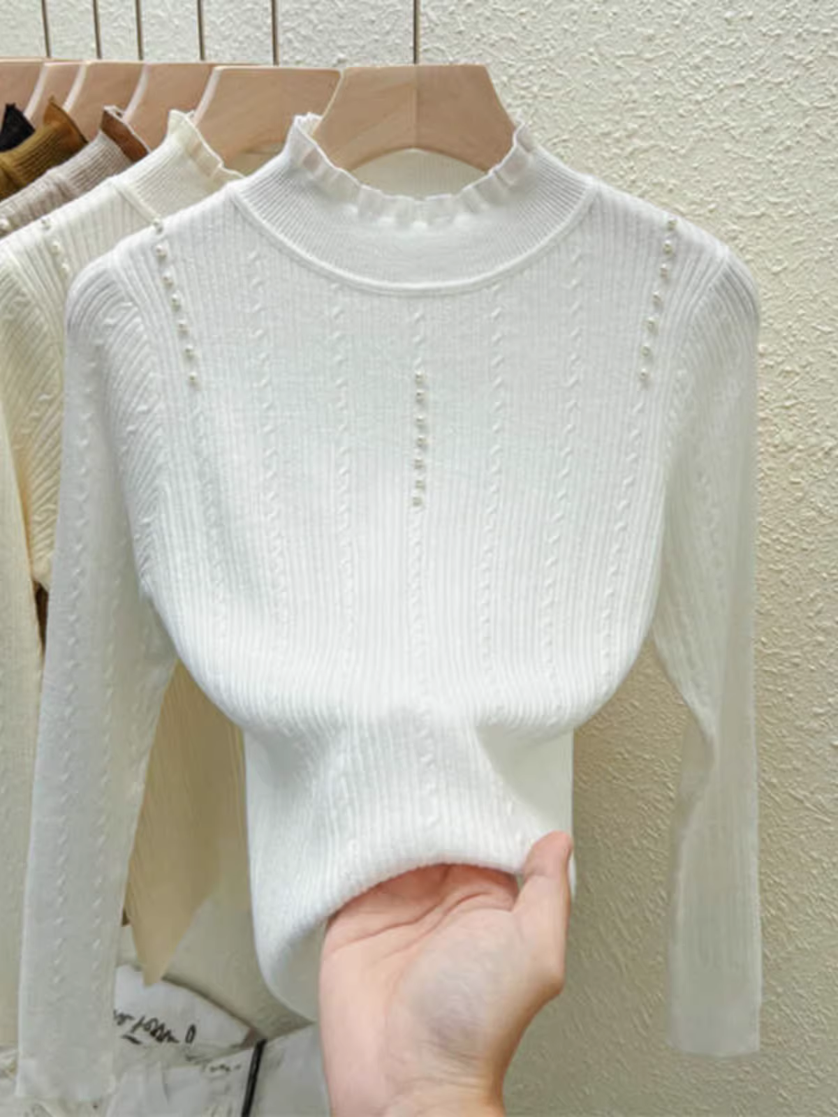 Giảm giá quần áo nữ châu Âu, áo len thiết kế giảm giá với cổ nửa cao, trang phục len thời trang để phối lớp trong mùa thu đông.