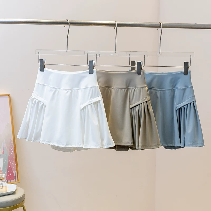 Váy tennis nữ, kiểu dáng mùa hè mới, chống lộ hàng, váy chạy bộ thể thao, nhanh khô chuyên nghiệp, váy yoga cầu lông che hông.