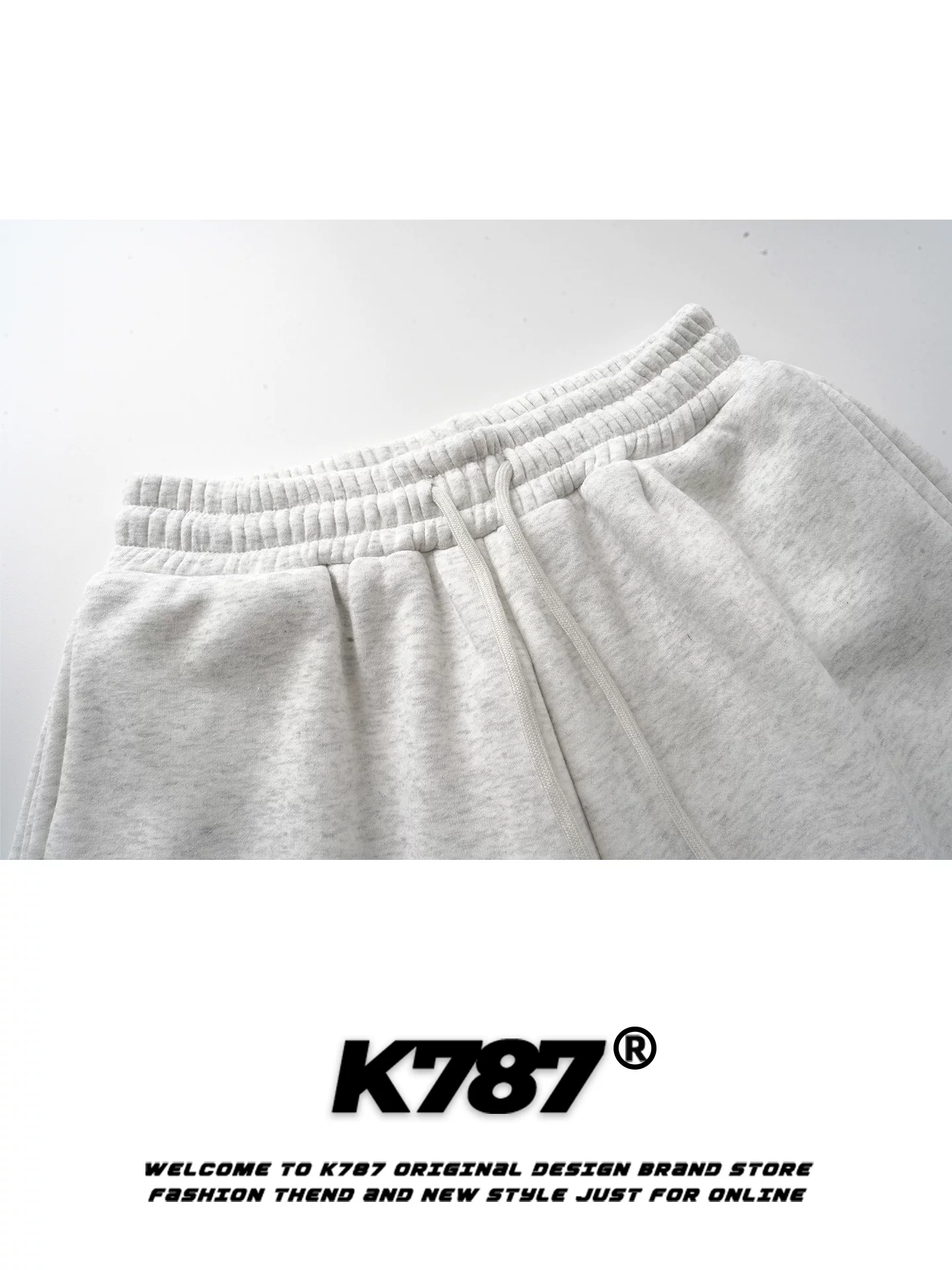 Quần jogger thể thao rộng ống, kiểu dáng unisex, chất liệu thun kiểu Mỹ K787, có thêu chữ bên hông.