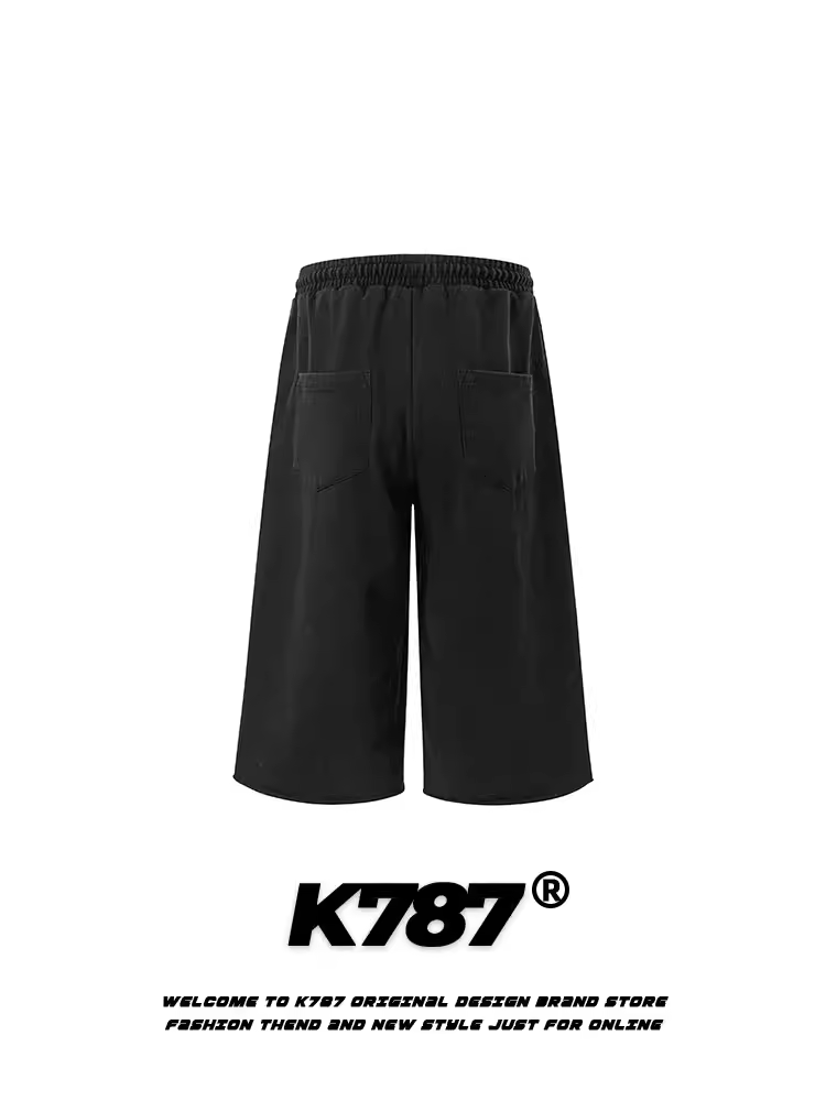 Quần short unisex K787 kiểu Mỹ cổ điển, chất liệu trơn, dáng xuông, cạp cao, ống rộng, bo gấu.