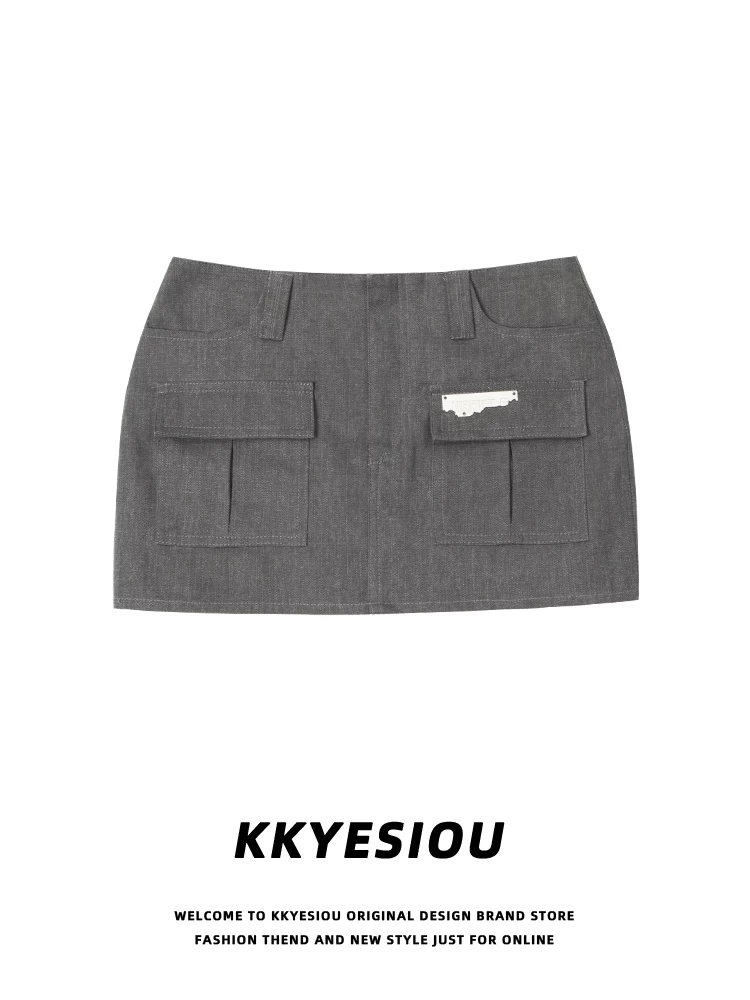 Váy ngắn màu xanh quân đội phong cách đường phố Mỹ KKyesiou, kiểu preppy, thiết kế công sở, cạp cao ôm sát hông.