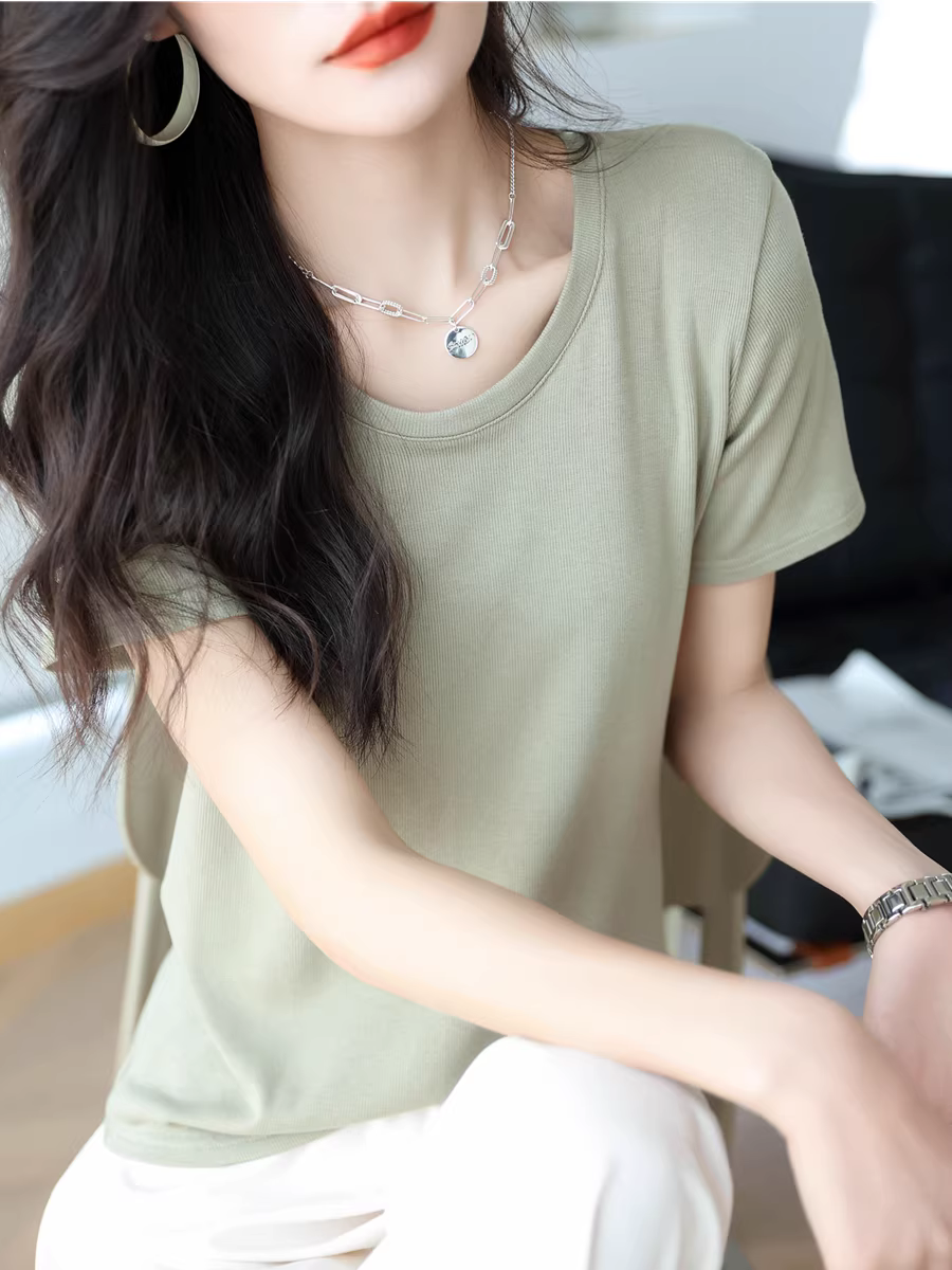 Áo thun nữ tay ngắn chất liệu thun gân, màu trơn, cổ tròn, dáng rộng, co giãn, tôn dáng, mặc được nhiều kiểu