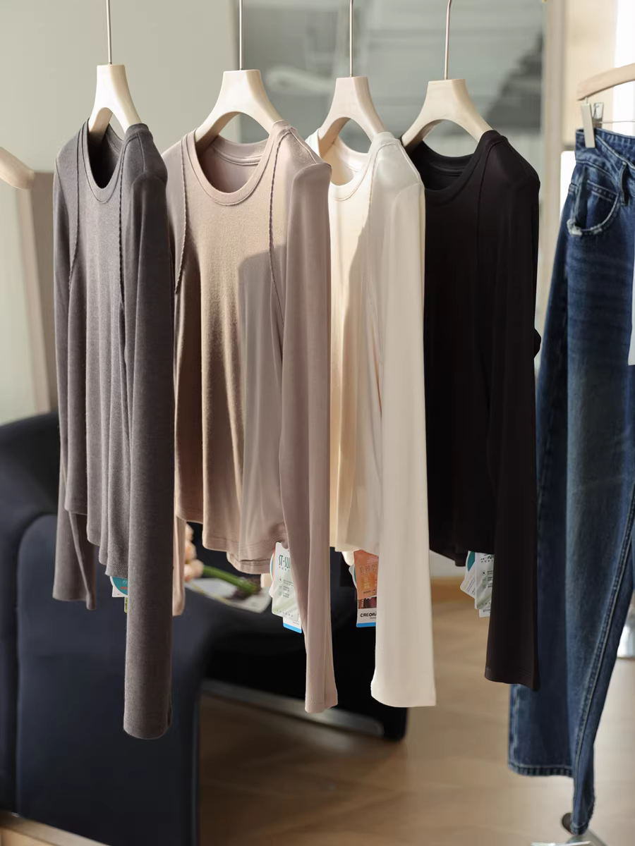 Áo thun len modal tay dài màu trơn đa năng, kiểu dáng cơ bản giúp bạn trông thon gọn hơn! Mẫu mới cho mùa thu.