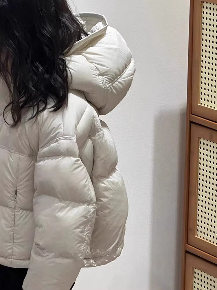 Áo khoác ngắn màu trắng phong cách Hàn Quốc dành cho nữ mùa đông kiểu mới có mũ trùm đầu dày dặn ấm áp dành cho các cô gái lớn tuổi