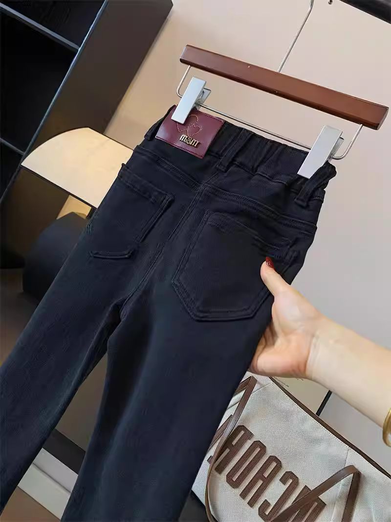 Quần jean loe nữ trẻ em, quần áo mùa thu, kiểu đơn giản đa năng, cạp cao, màu đen, chất liệu washed, kiểu dáng ôm body, chất liệu thun co giãn dành cho học sinh.