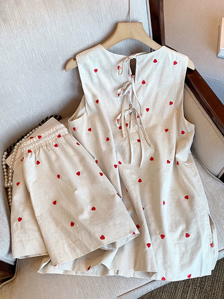 Bộ đồ thêu hình trái tim bằng vải lanh dành cho bé gái mùa hè phong cách mới thời trang áo vest quần short hai mảnh dành cho trẻ lớn hơn