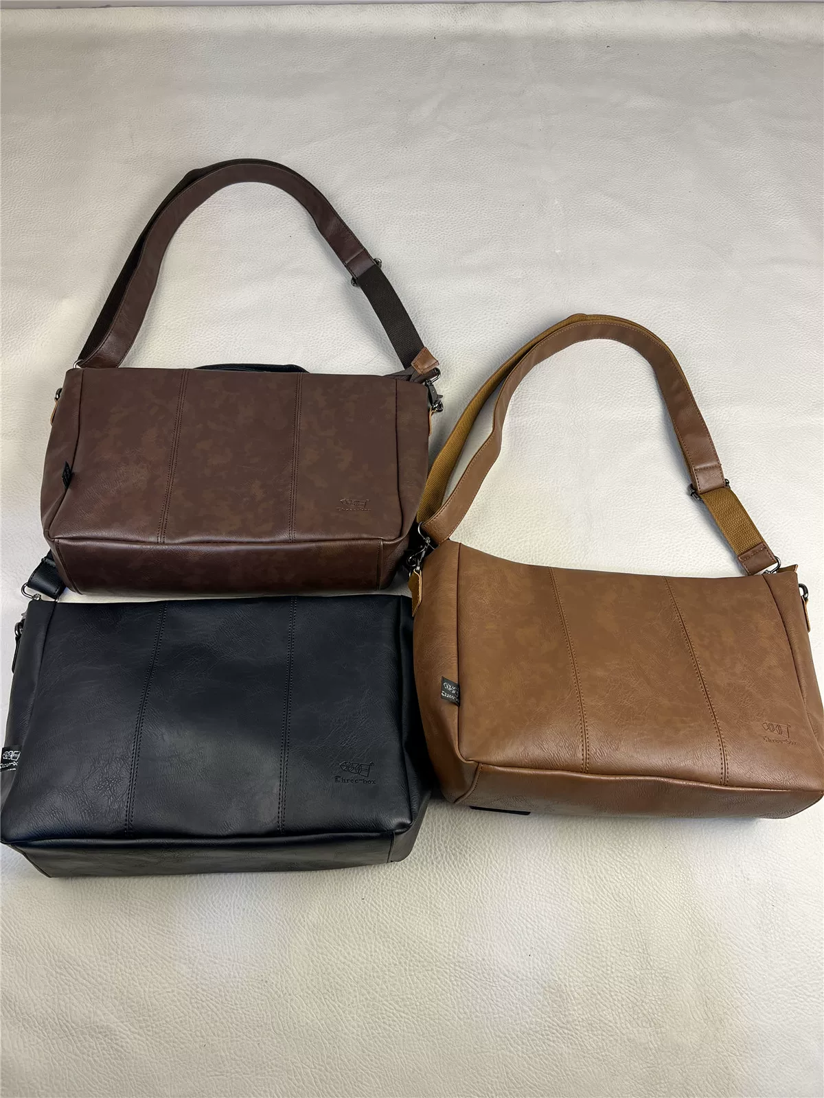 Ba hộp túi đeo chéo nam bằng da mềm mới, ba lô sức chứa lớn, cặp tài liệu A4 thông thường dành cho người đi làm, unisex.